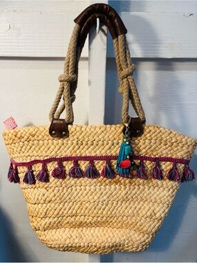 Large colorful straw tote with tassel details